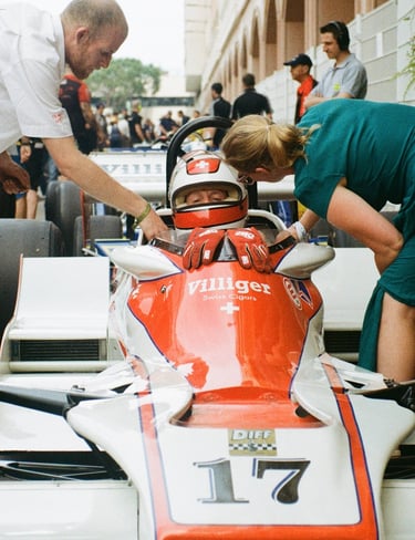 a race car driver getting ready before the race