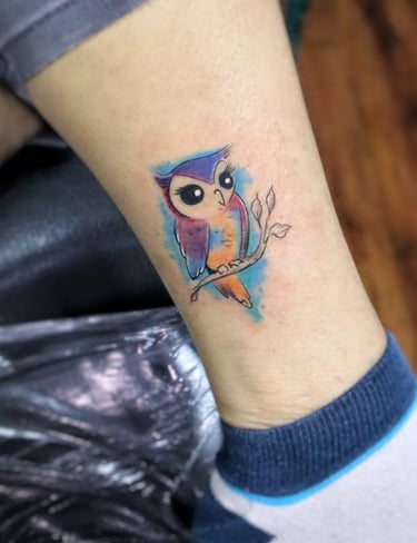 Watercolor Owl tattoo by Dudo's Tattoos Hyderabad