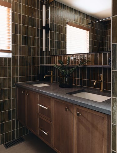 a bathroom with a sink and a large mirror