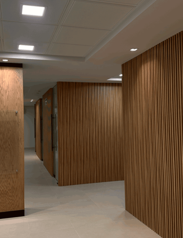 Pasillo con puertas de cristal y paneles de madera verticales | KARÄNA