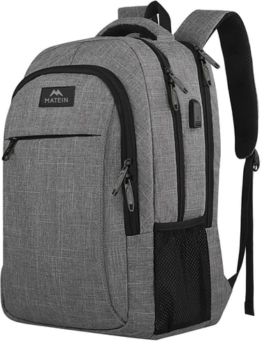 Grey Matein travel laptop backpack with USB charging port and multiple anti-theft zipper compartments.