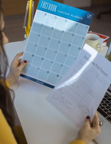 A mom creating a schedule to create content.