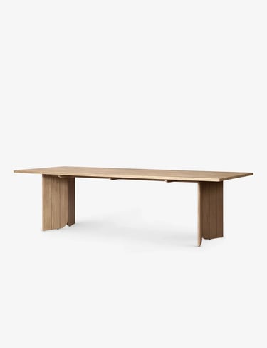Minimal wooden outdoor table with simple design, suitable for a calm garden corner or patio seating 