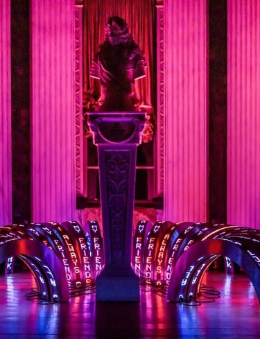 Jenny Holzers's Pink neon light art installation at Blenheim Palace.