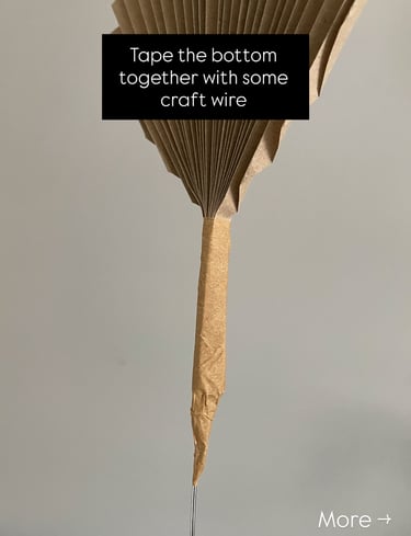 accordion-style folded flower petal for DIY lamp shade, taped with brown paper tape and wire