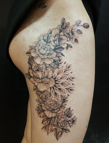 fine line flower tattoo