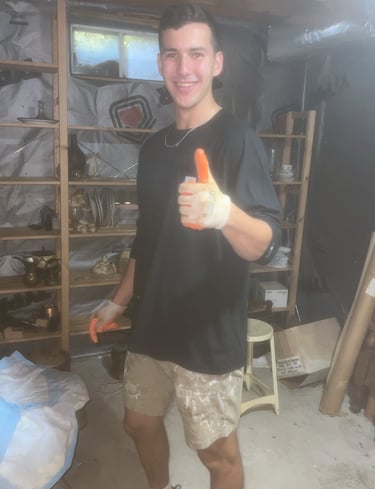 Junk removal crew wearing protective gear during cleanout work