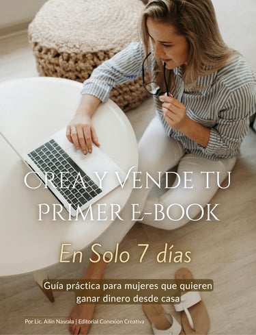 a woman sitting at a table with a laptop computer