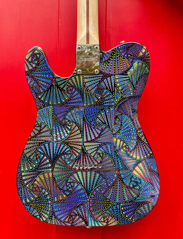 Hand-painted guitar by Nancy Elhallak. Ronnie Wood of the Rolling Stones and Paul Weller of the Jam 