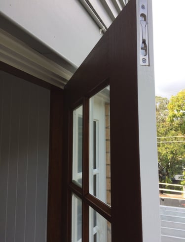 Ashgrove residence timber door and window staining by PJCPainters