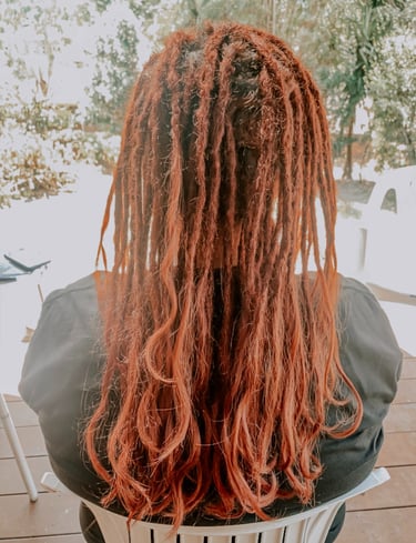 a woman with dreadlocks