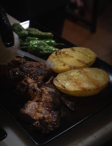a plate of food with potatoes and potatoes on it