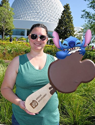 Katy Kaluzny pictured in front of Spaceship Earth at EPCOT®.