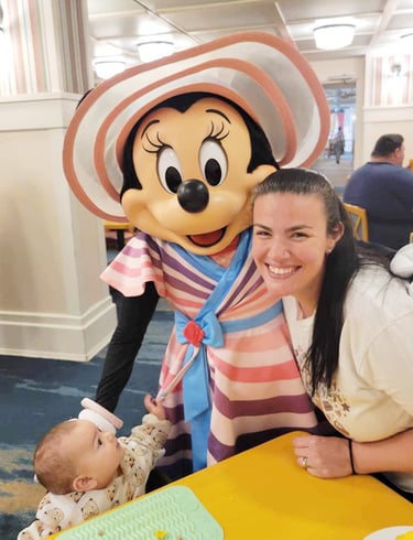 Sarah Rengulbai pictured with Minnie Mouse at Walt Disney World® Resort.