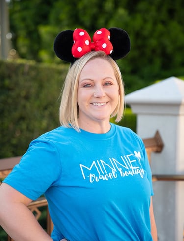 Amy Haskell pictured at Disney's Magic Kingdom® Park.