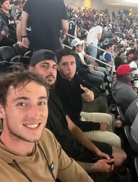 Dylan Frazier, DJ Young & Pablo Tellez taking in an NBA game