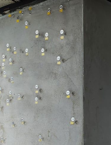 Supporting beam showing many bullet holes