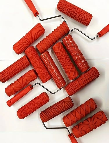 a bunch of red texture paint rollers 