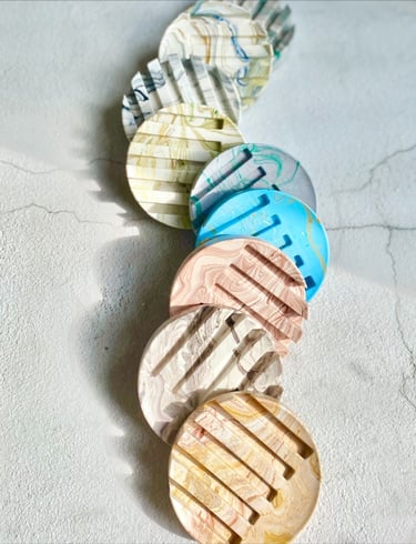 Eco friendly jesmonite soap dishes in variety of colours with marble effect