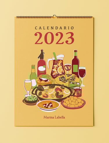 a 2023 calendar cover with food plates of Spanish gastronomy