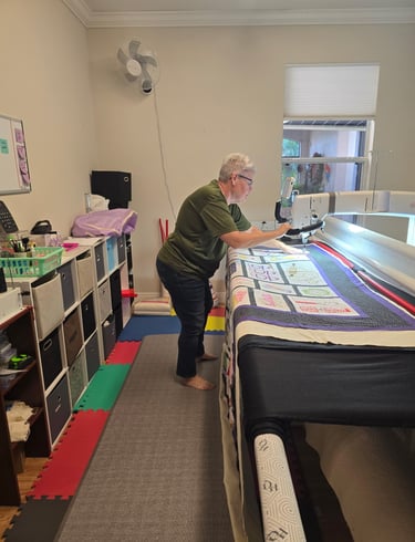Long-arm quilting in progress at Stitches N Ditches studio in Kissimmee, Florida