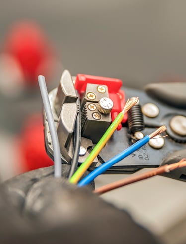 Brownwood electrician using a wire splitter 