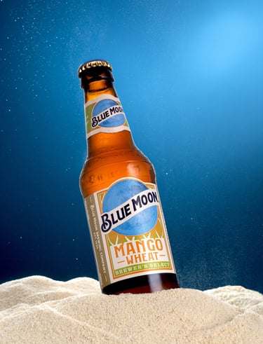 bottle of Blue Moon beer on the Moon sand in the Space