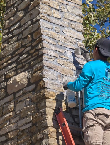 "Natural stone chimney crafted by Profaster Services in Des Moines."