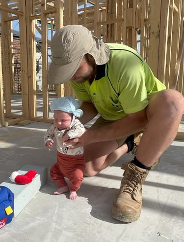 Dylan with Rory visiting dad at work