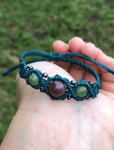 web constructions green bracelet