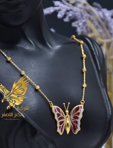 a woman's torso and torso with a butterfly pendant |  | Alkanz Alasifar | Antalya Jewellery