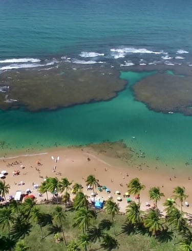 a beach with a view of a beach and a sandy beach