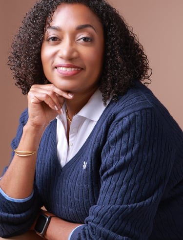 Beverly Vanterpool in a blue sweater and a white shirt