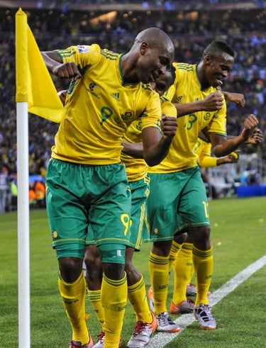 South African players celebrate a World Cup goal in 2010 by doing the Diski Dance