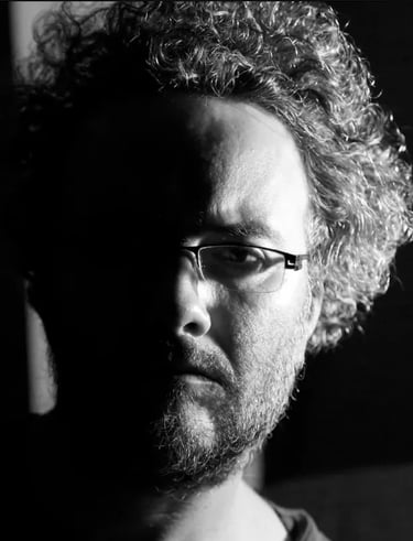 Portrait of film instructor Tan Tolga Demirci