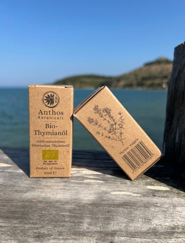 two boxes of organic thyme essential oils