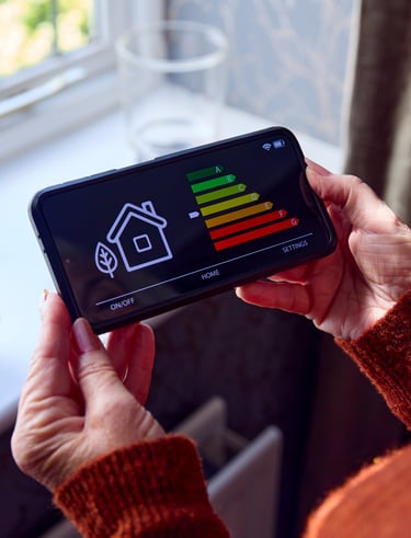 Home Owner checking energy rating on their mobile phone