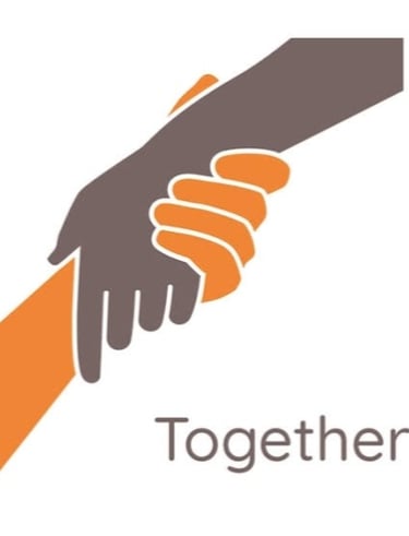 a handshake of two hands holding hands together green Way Association