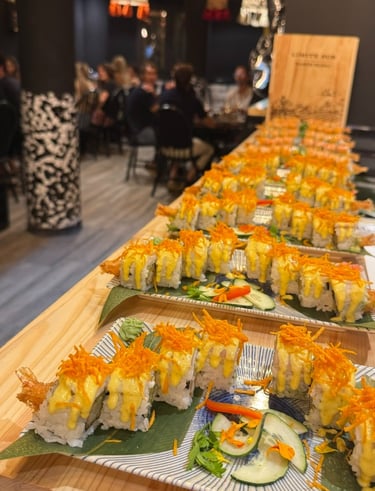 a long table with several different types of food