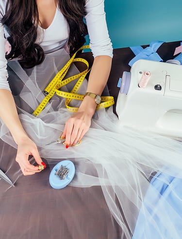 a woman working with the sewing machine