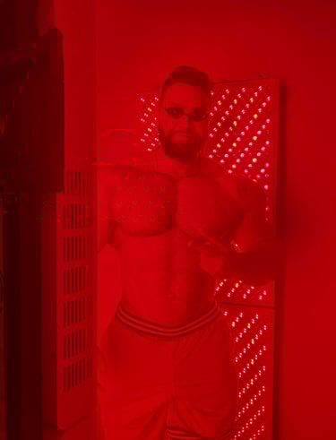 a man in red light redlight therapy 