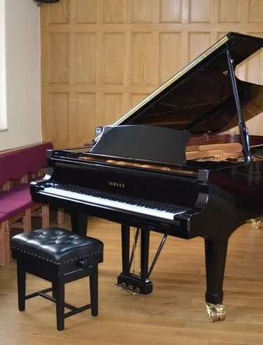 Concert grand piano used for lunchtime concerts and recitals at Wesley Centre Harrogate