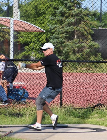 Masters athlete throws hammer at a Throwers Club event at York University’s Toronto Track and Field.