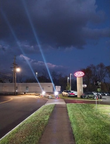 Searchlights at car dealership promotion