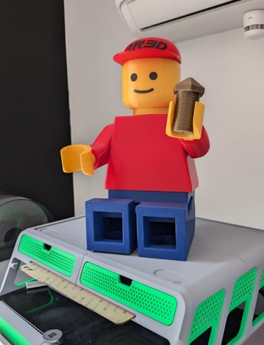 figurine Lego sur une machine d'impresssion 3d