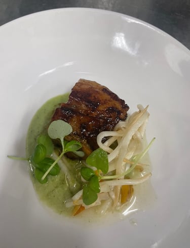 Pork belly with green curry puree and pickled carrots and bean sprouts