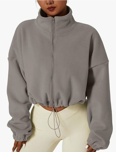 light brown/grey coat with high neck and bungie bottom