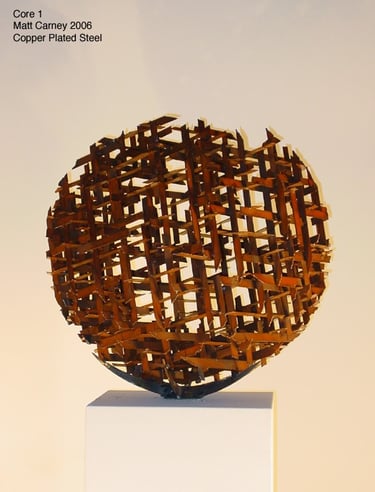 a copper plated steel cross-hatched sphere shaped sculpture