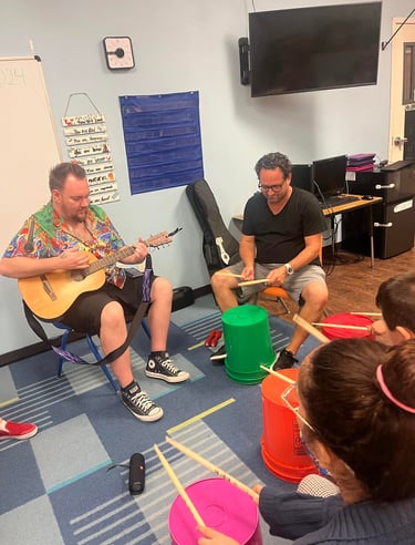 john teaching with bucket drum rhythm