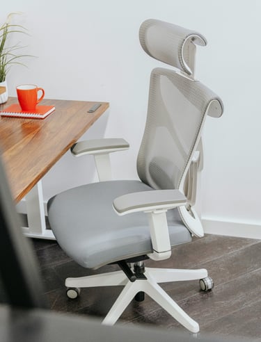 a ergonomic office chair with a cup of coffee and a cup of coffee